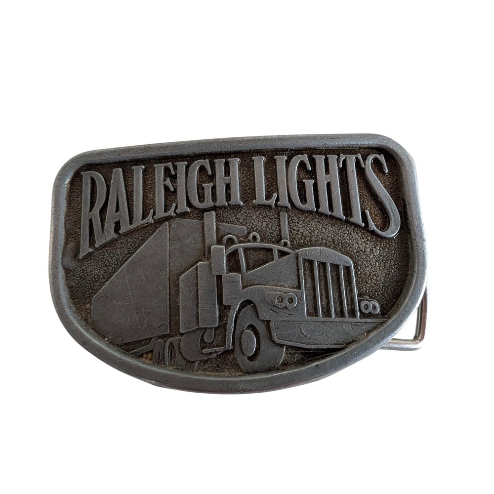 Vintage Raleigh Lights Semi Truck Belt Buckle Pewter Tone Tobacco Promo Big Rig